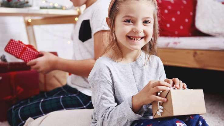 Girl opening present