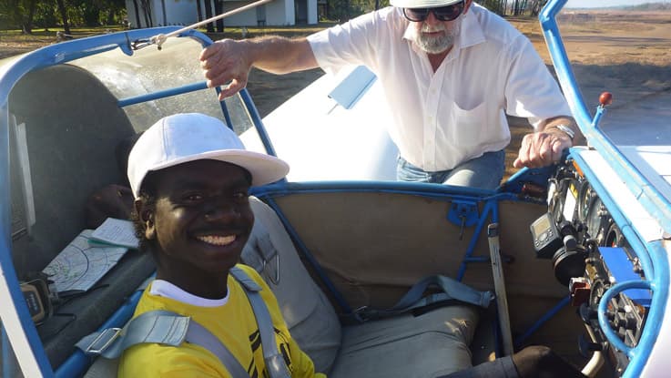 Lloyd and Gavin ready to take off in a plane for Experiential Mentoring program