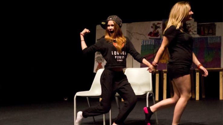 Girls performing theatre