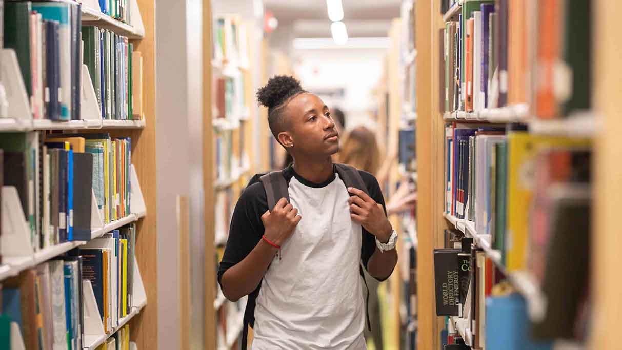 catch-up-learning-boy-in-library